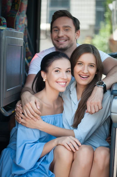 Pretty young friends are enjoying their trip — Stock Photo, Image