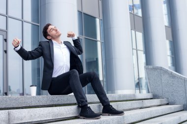 Handsome man is preparing for work in morning