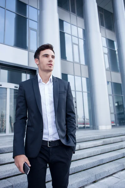 Attractive young man has a business meeting — Stock Fotó