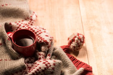 Holiday warm clothing and hot drink in cold weather
