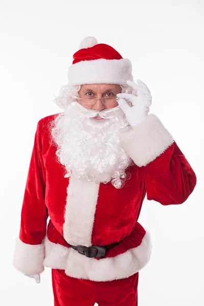 Friendly Father Christmas is preparing for celebration — Stock Photo, Image