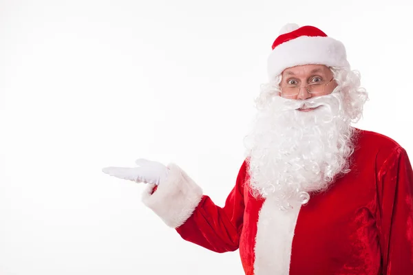 Cheerful Father Christmas is advertising something interesting — Φωτογραφία Αρχείου