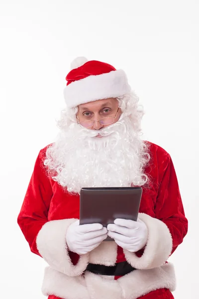 Old Father Christmas is gifting modern technology — Stok fotoğraf