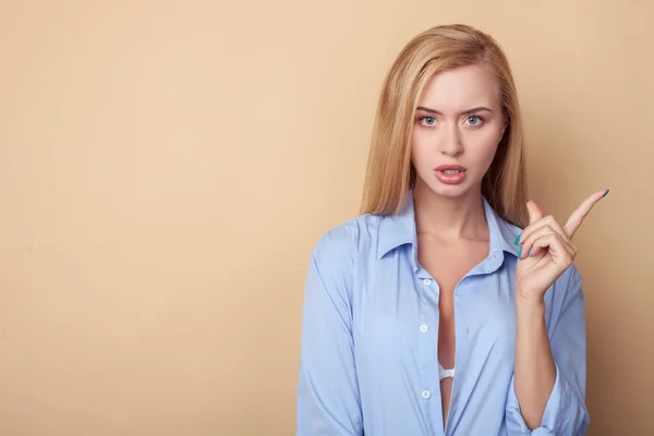 Cheerful young blond woman in male clothing — Stock Photo, Image