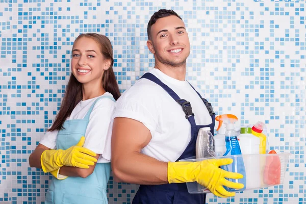 Cheerful washers are doing clean-up in bathroom — Stok fotoğraf