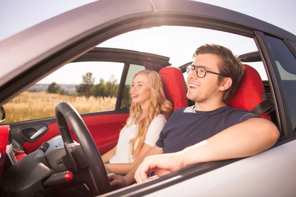 Cute loving couple is traveling by their transport — Stock Photo, Image