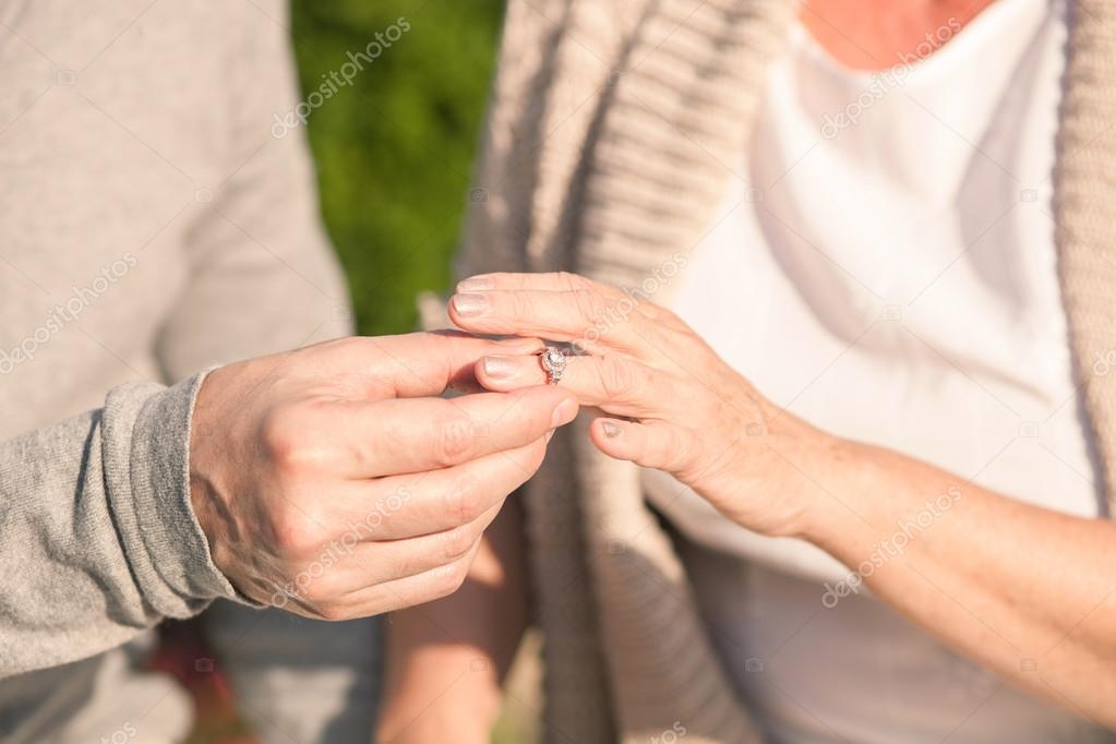 Pretty old married couple is celebrating their anniversary