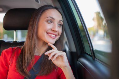 Attractive young woman is enjoying her trip