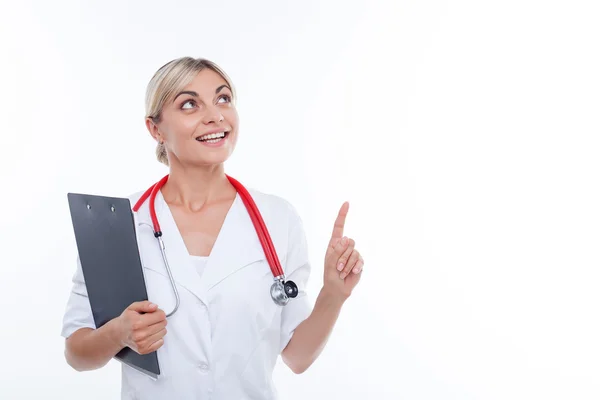 Attractive young female doctor is working with interest — Stok fotoğraf