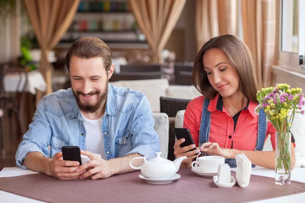 Beautiful young loving couple is dating in cafeteria — Φωτογραφία Αρχείου