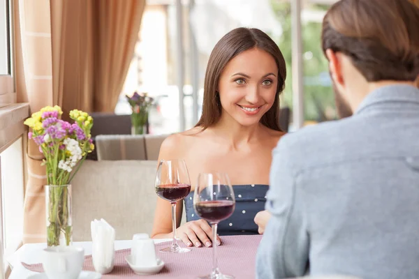 Attractive young loving couple is dating in cafe — ストック写真