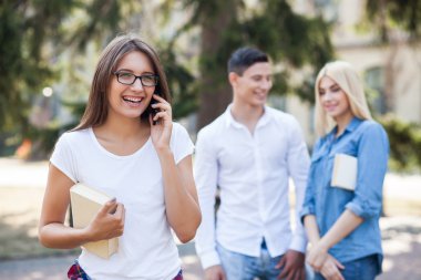 Cute young friends are ready for their studying