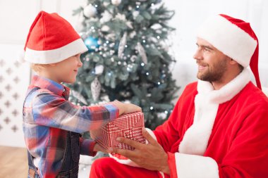 Cute friendly family is celebrating New Year