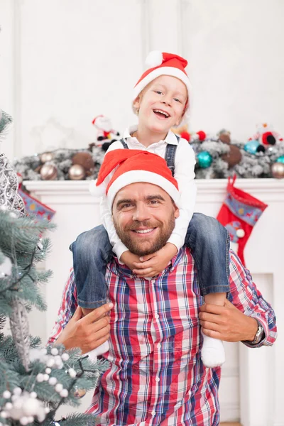 Pretty friendly family is making fun in New Year — Stock Photo, Image