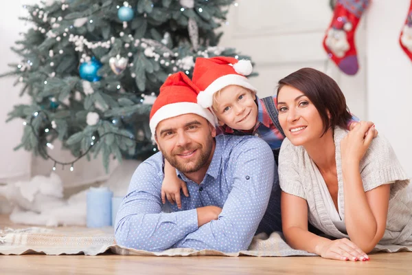 Cheerful friendly family is celebrating New Year — Stock Photo, Image