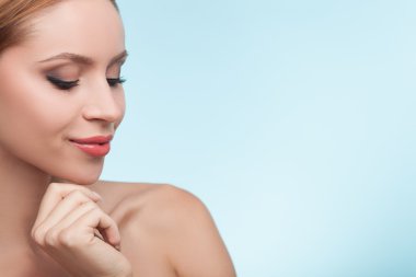 Cheerful young girl with beautiful smooth skin