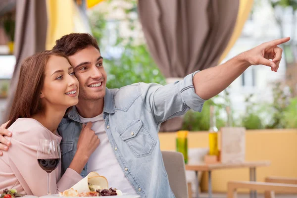 Attractive young loving couple is resting in restaurant — Φωτογραφία Αρχείου