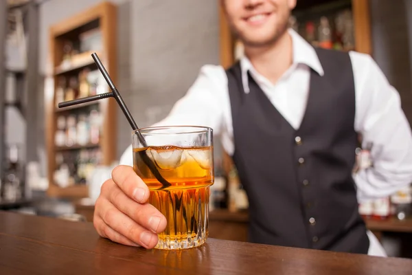 Cheerful male barman is working in bar — 스톡 사진
