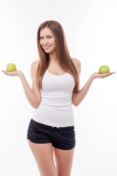 Jovem atraente com frutas frescas verdes — Fotografia de Stock