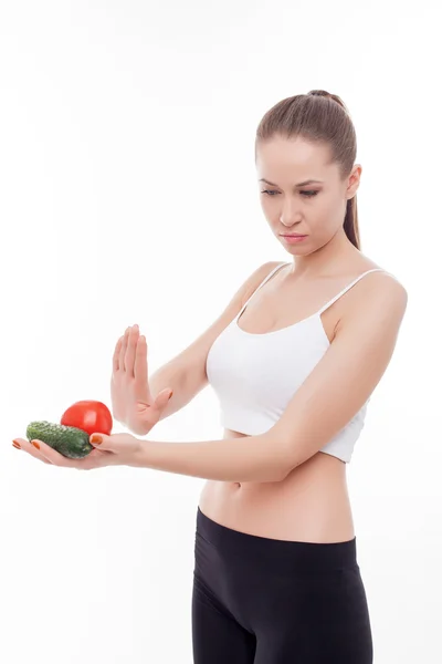 Beautiful girl is refusing from healthy eating — Stockfoto