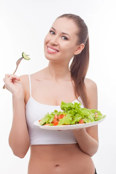 Cheerful fit girl is dieting with healthy food — 图库照片