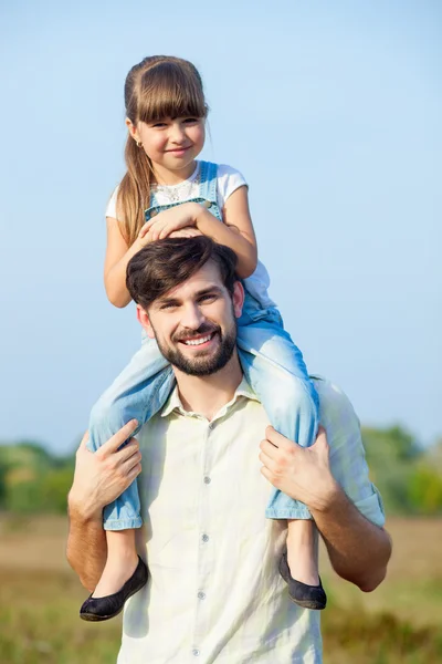 Cute family is resting in the nature — Stock Photo, Image