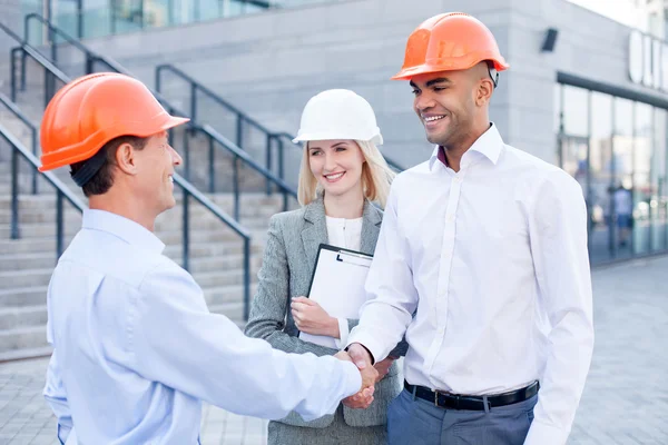 Professional construction team made a deal with handshake — Stockfoto