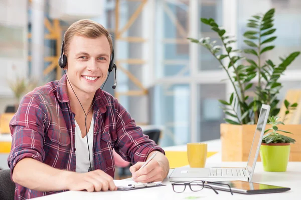 Cheerful customer surface representative is working in office — Stock Photo, Image