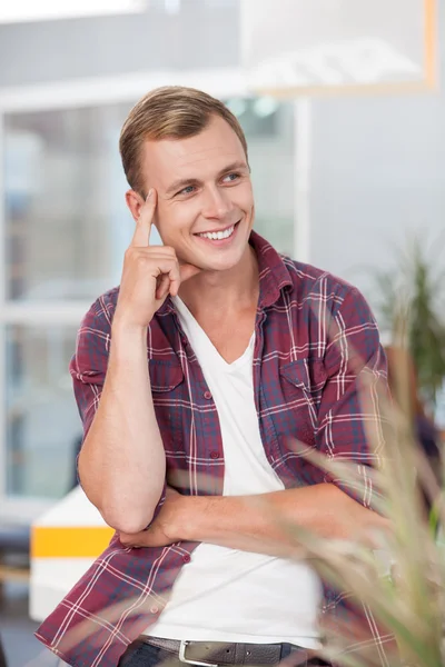 Cute young male manager is working with joy — Stock Photo, Image