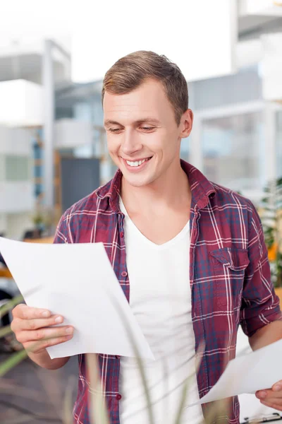 Cheerful male manager is working with joy — Stock Photo, Image