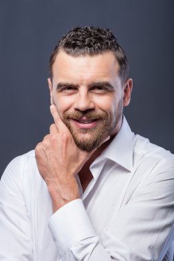 Handsome young bearded guy with pretty smile
