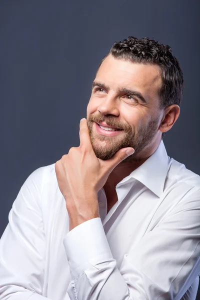 Attractive bearded businessman is thinking about his future — Stockfoto