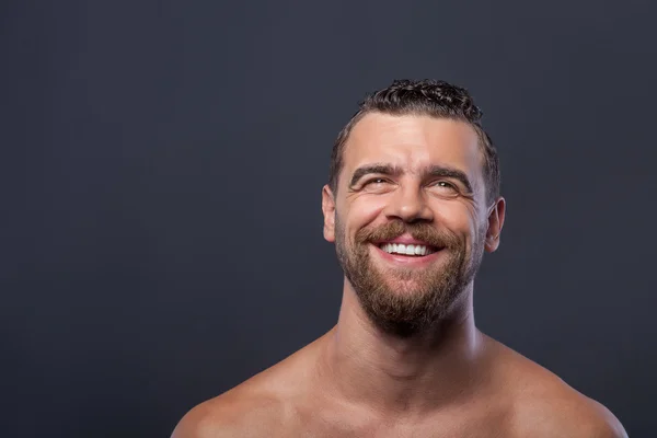 Attractive young bare guy with beard laughing — Φωτογραφία Αρχείου