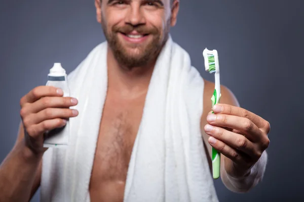 Handsome bearded guy is preparing for date — Stock Fotó