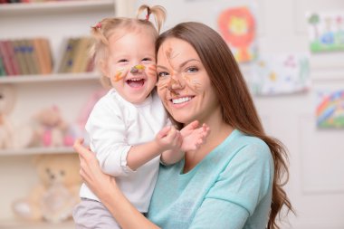Pretty friendly family is spending time with joy