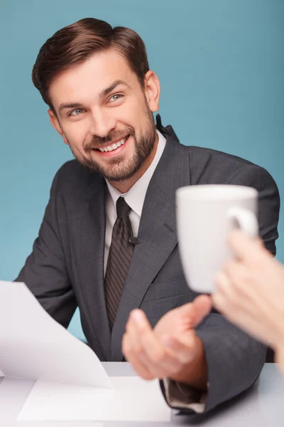 Handsome young anchorman is making a break — Stockfoto