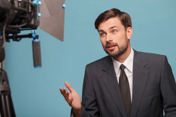 Cheerful young reporter is telling some news — Φωτογραφία Αρχείου