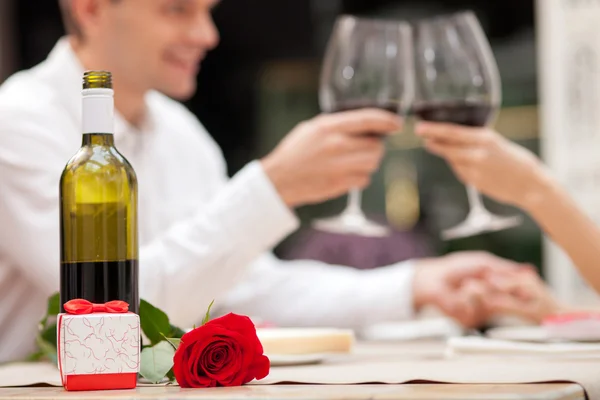 Cheerful loving couple is celebrating in cafe — Stock Fotó