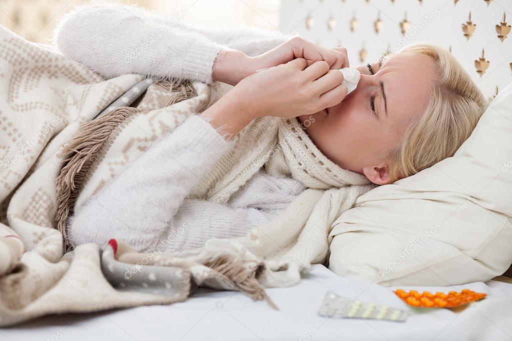 Cute ill girl has caught a cold — Stock Photo © iakovenko123 90753876