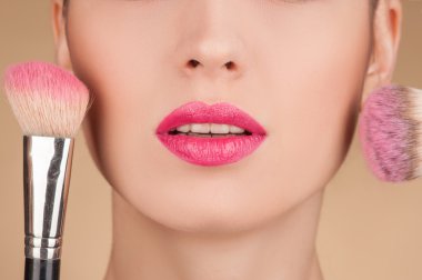 Pretty female model is receiving skin treatment