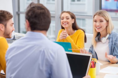 Skillful young designers are discussing new project