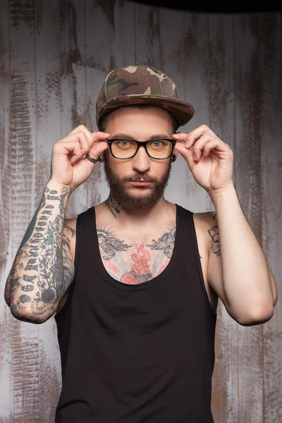 Attractive man with beard and eyewear — Stockfoto