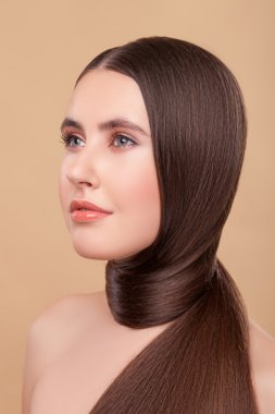 Attractive young woman with strong perfect hairstyle