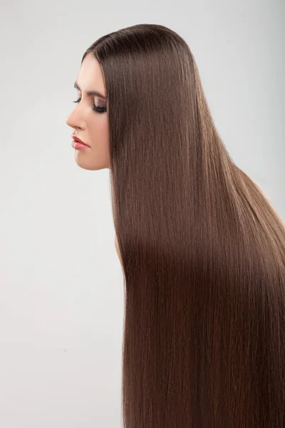 Beautiful young girl with pretty perfect hairstyle — Stock Photo, Image