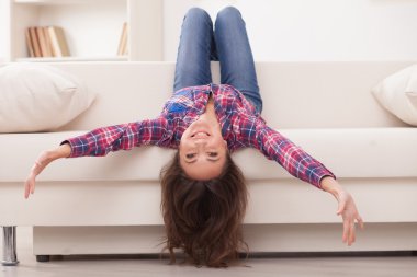 Attractive slim girl is making fun at home