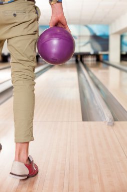 Cheerful young guy is preparing for game