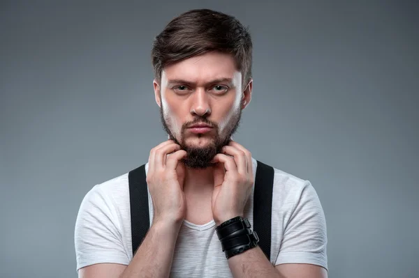 Handsome young guy is expressing his masculinity — Stock Photo, Image