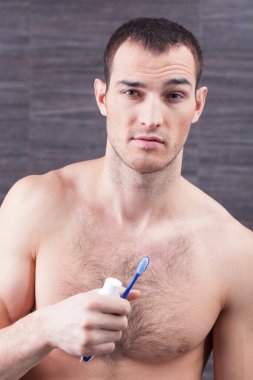 Cheerful guy is caring of his health