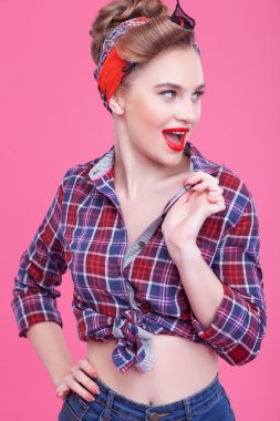Cheerful young woman is expressing positive emotions