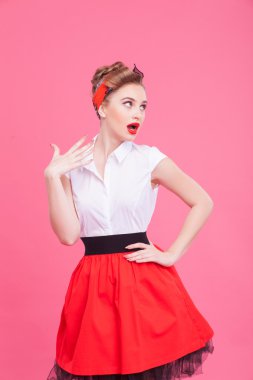 Attractive pin-up girl is flirting with somebody